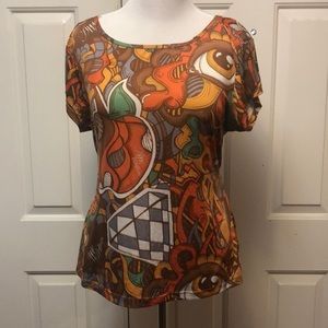 Criss cross open back Apple bottom shirt